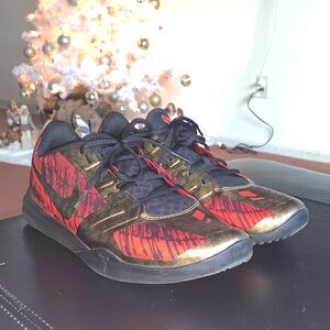 Nike KB Mentality Black Metallic Gold Chilling Red Ironman